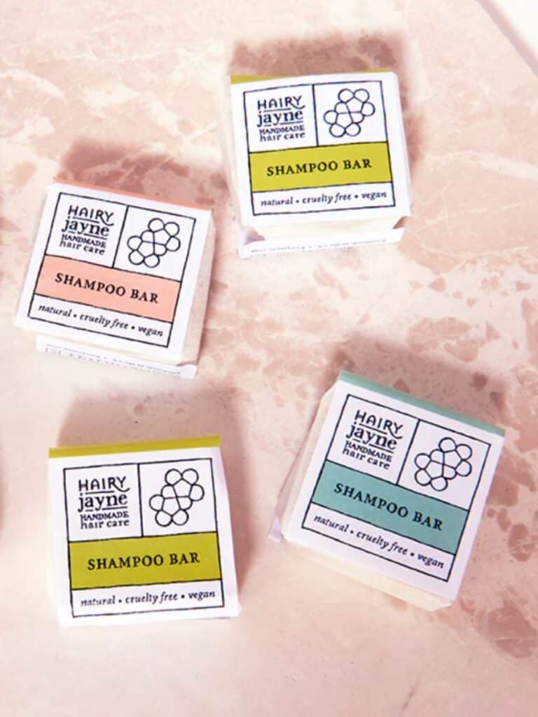 A selection of Hairy Jayne natural shampoo bars in pastel packaging, perfect for a sustainable and plastic-free hair care routine.