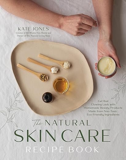 A flat lay of “The Natural Skin Care Recipe Book” by Kate Jones, featuring DIY organic beauty recipes with non-toxic ingredients.