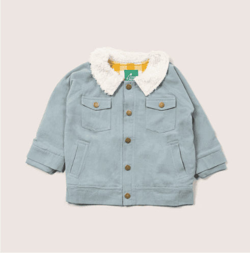 Light blue toddler jacket with a fluffy white collar, two front pockets with snap buttons, and a green patch inside. The inner lining is yellow plaid. Brown snap buttons run down the front.